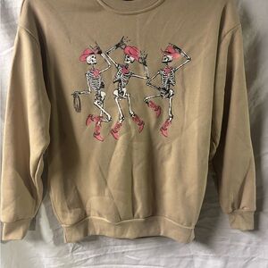 Together Tan Crewneck Sweater with Pink Skeleton Dance Print